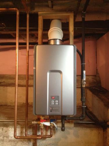 Wall-mounted-Tankless-install-in-lake-house-basement-that-takes-rain-water